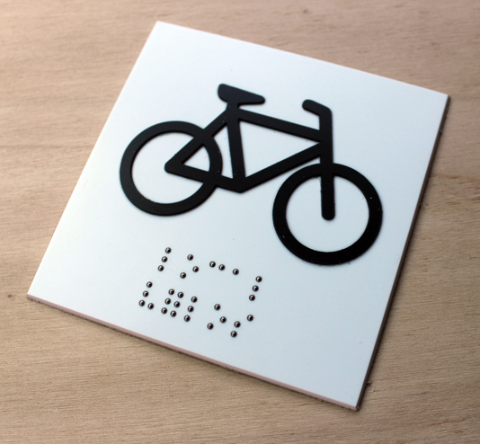 plaque braille local à vélos